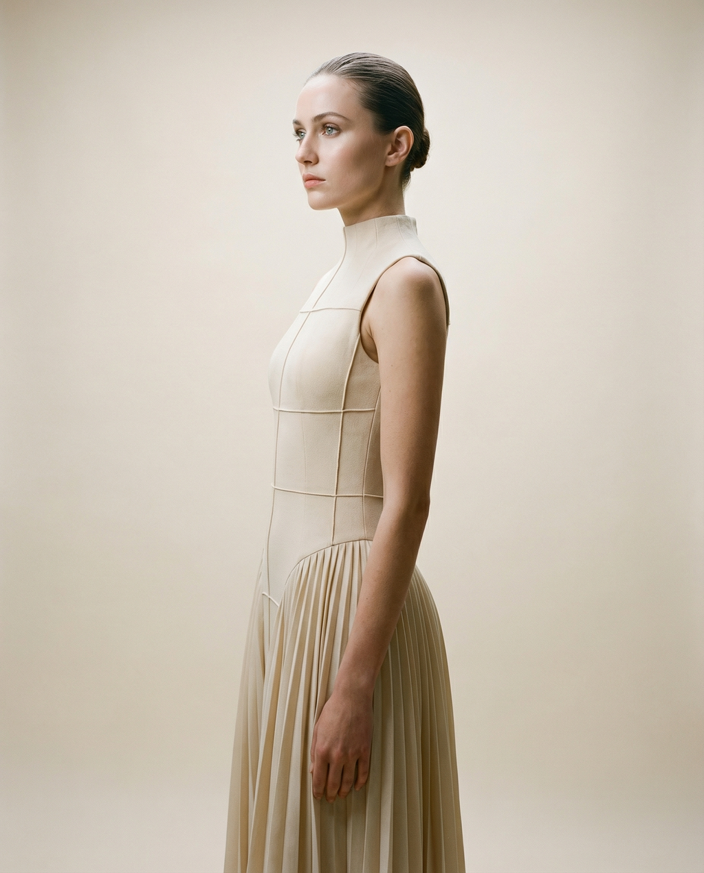 Architectural Bodice Dress with Soft Pleated Skirt