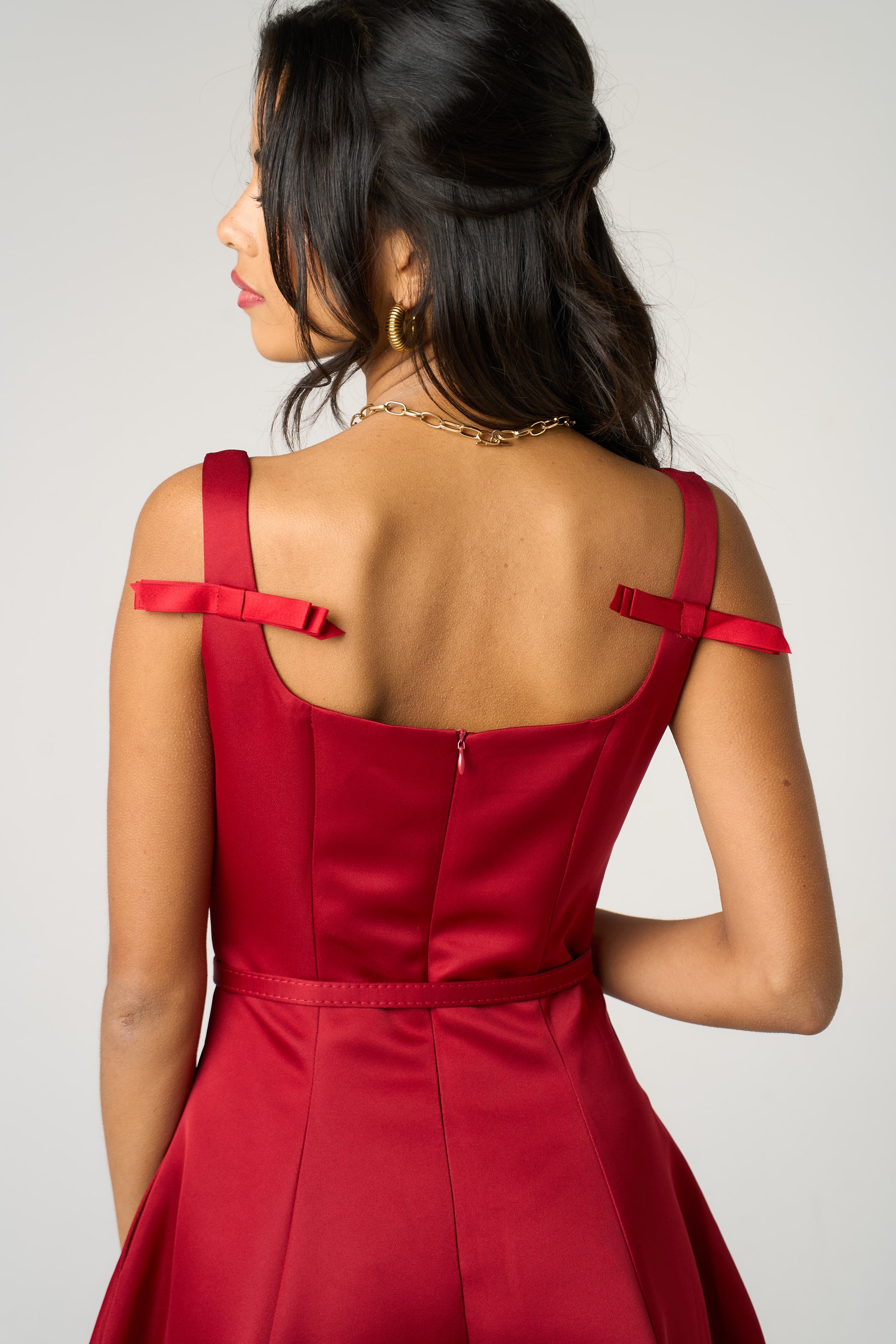 red strapless dress with bows