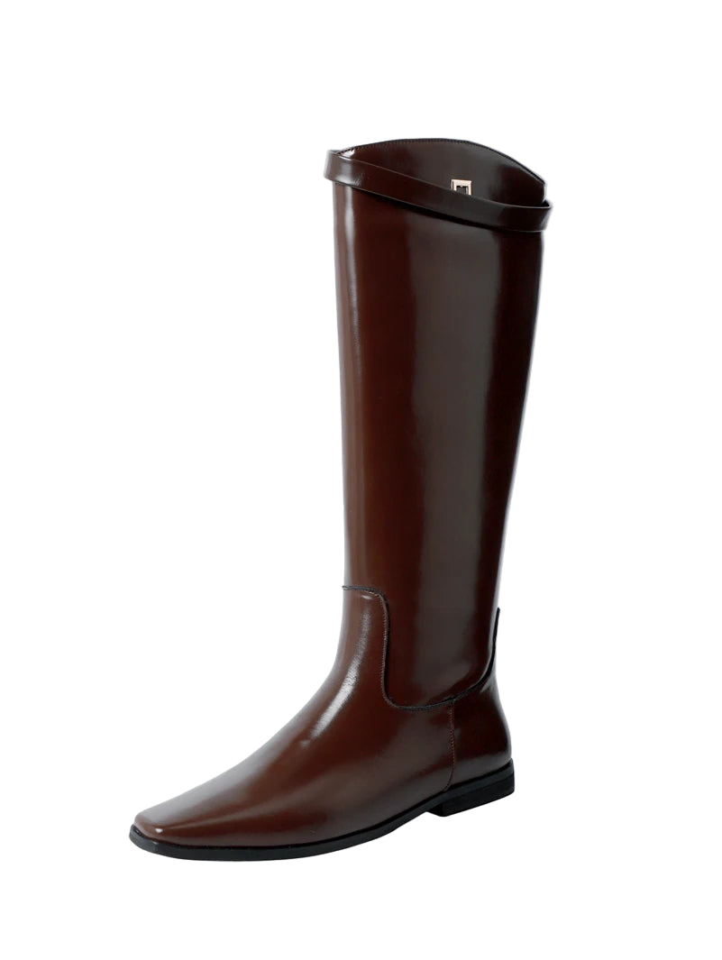 Brown riding boot on a white background