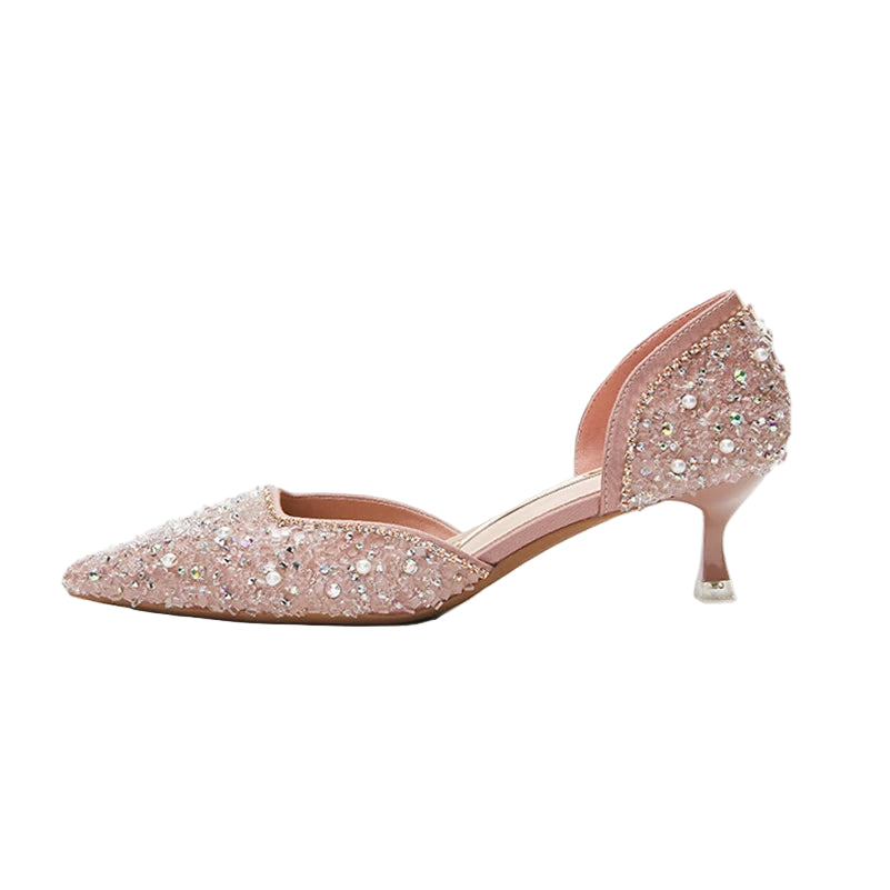Pink glittery shoe on a white background