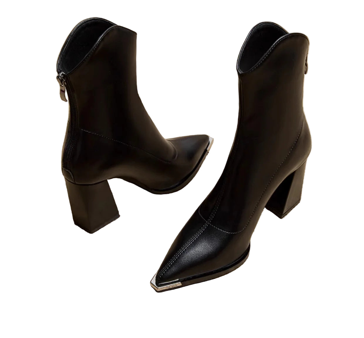 Black ankle boots with block heels on a newspaper background