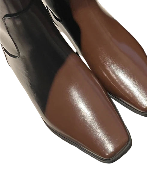 Brown leather boots with a black block heel 