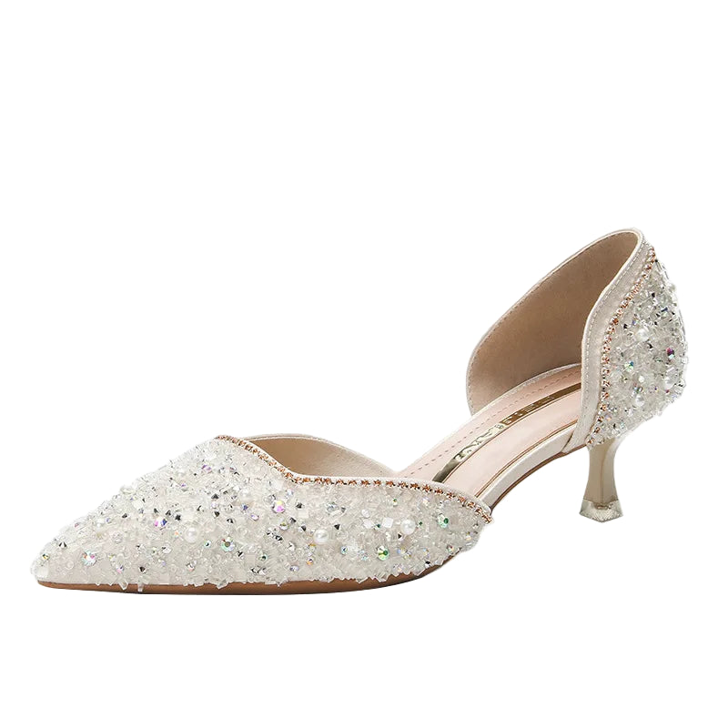 Sparkly high-heeled shoe on a white background